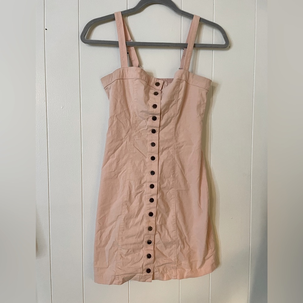 Pale pink short dress with buttons down the front